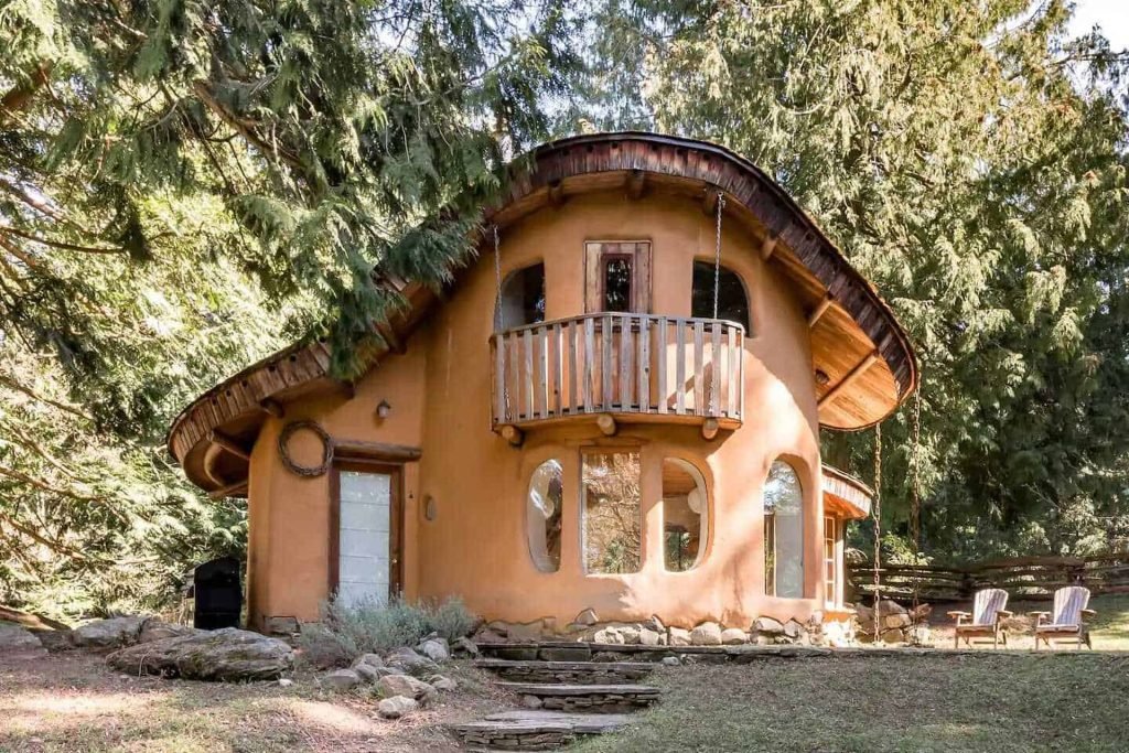 A cob house with unique, artistic architecture